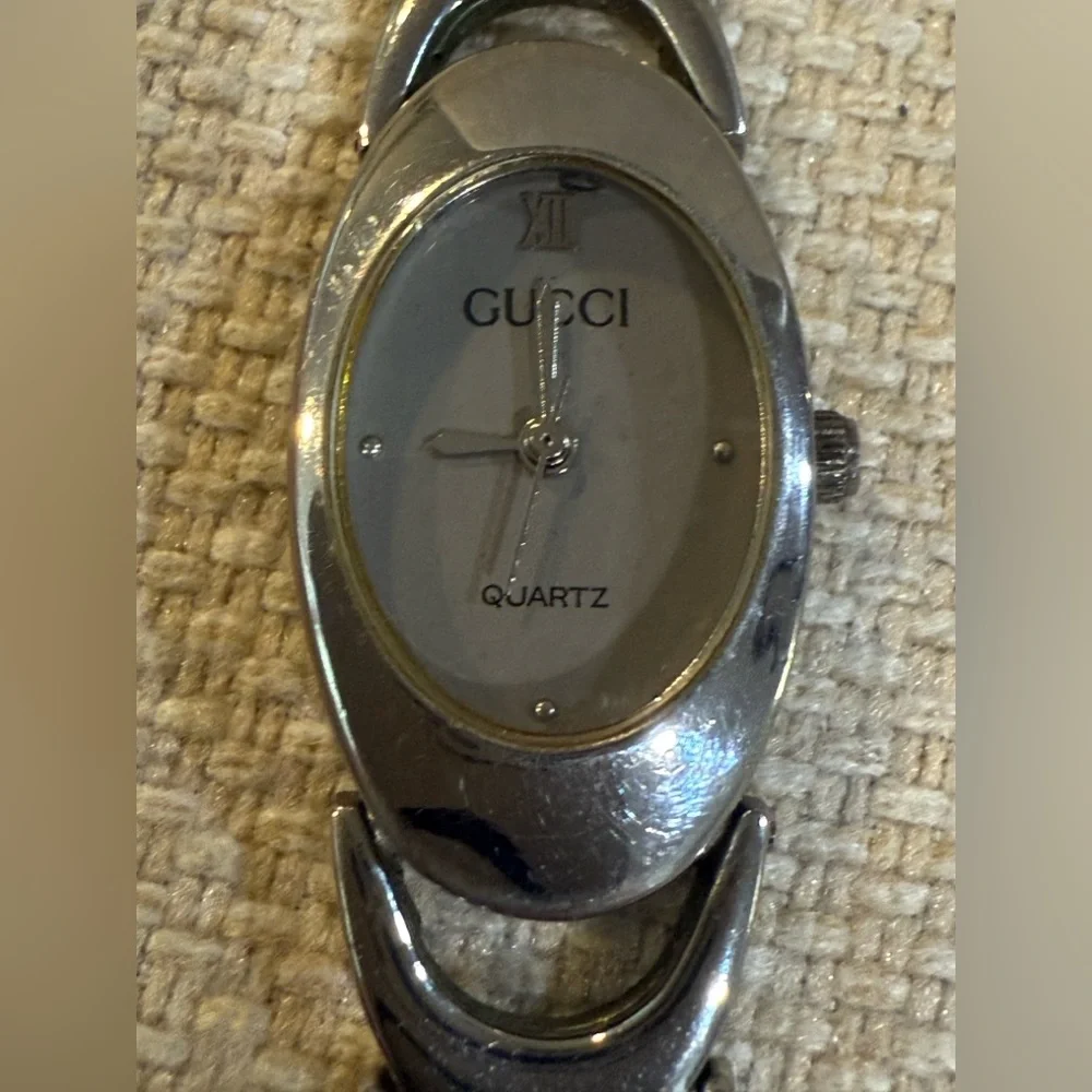 Gucci Metallic Silver Oval Watch
